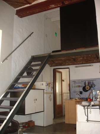 the stairs that leads to the bedroom. downstairs, the bathroom and the kitchen